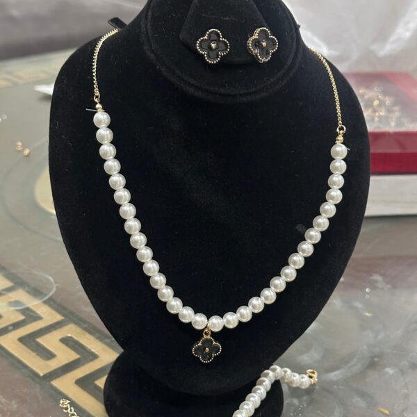 Imported White malaa with black flower